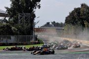 Verstappen trims deficit as rivals rage over FIA
