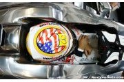 Hamilton puts racy initials on US GP helmet