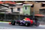 Vettel flies to pole in wet qualifying