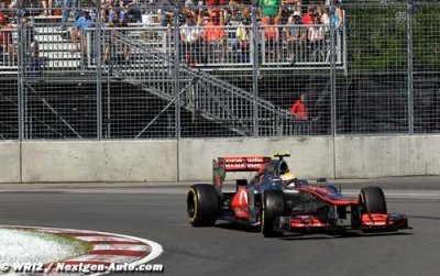 Hamilton takes title lead as seventh winner of 2012