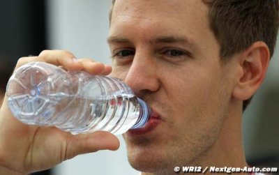 Vettel back to work next week after title party